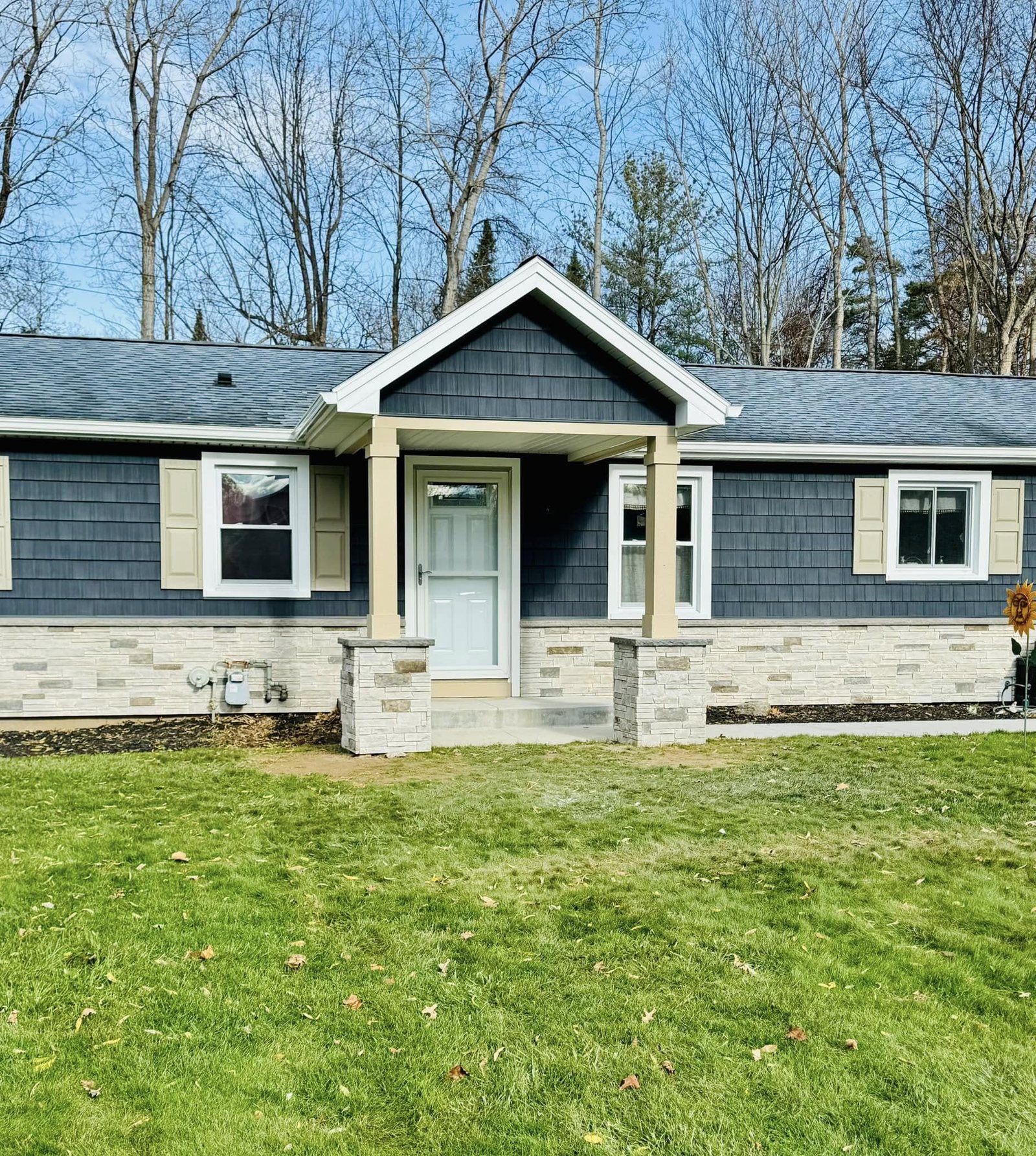 Home exterior with new siding and roofing